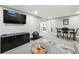 Finished basement with room for exercise and other recreational activities at 2714 S Raleigh St, Denver, CO 80236