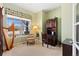 Bright office featuring a harp, chair, desk, and window at 4932 Democrat Dr, Broomfield, CO 80023