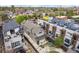 Stunning aerial view of the modern home with a well-manicured backyard and an inviting patio area at 1832 W 33Rd Ave, Denver, CO 80211