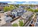 Stunning aerial view showcasing an outdoor living space, modern architecture and fenced in yard at 1832 W 33Rd Ave, Denver, CO 80211