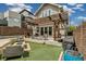 Backyard with turf, patio and pergola at 1832 W 33Rd Ave, Denver, CO 80211