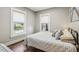Cozy bedroom with wood floors and bright windows at 1832 W 33Rd Ave, Denver, CO 80211