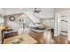 Spacious primary bedroom features hardwood floors, vaulted ceilings, and an ensuite bathroom at 1832 W 33Rd Ave, Denver, CO 80211