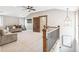Upstairs bonus room with a vaulted ceiling, ceiling fan, and wooden railing at 1832 W 33Rd Ave, Denver, CO 80211