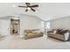 Large bonus room features neutral colored walls and carpet at 1832 W 33Rd Ave, Denver, CO 80211