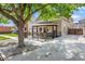 Charming home featuring a front porch with flower boxes and patio furniture with a mature tree at 1832 W 33Rd Ave, Denver, CO 80211