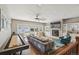 Inviting living room with fireplace, large windows, hardwood floors and access to the backyard at 1832 W 33Rd Ave, Denver, CO 80211