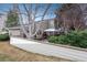 Exterior shot of a home highlighting the backyard with a gazebo and a water feature at 1585 W Briarwood Ave, Littleton, CO 80120