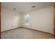 Neutral bedroom with carpet flooring, window view, and neutral paint at 1585 W Briarwood Ave, Littleton, CO 80120