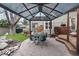 Outdoor living space with a gazebo, deck and landscaping at 1585 W Briarwood Ave, Littleton, CO 80120