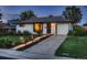 Charming single-story home with brick exterior, well-kept lawn, and inviting curb appeal at 40 Benton St, Lakewood, CO 80226