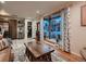 Bright living room featuring hardwood floors, a bay window, and comfortable seating arrangement at 40 Benton St, Lakewood, CO 80226