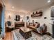 Cozy living room with stylish furnishings, hardwood floors, and abundant natural light at 40 Benton St, Lakewood, CO 80226