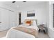 Comfortable bedroom with closet, soft carpet, and neutral decor for a peaceful retreat at 1232 N Yates St # 3, Denver, CO 80204