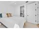 Bedroom featuring a large closet with shelving space and soft carpet at 1232 N Yates St # 3, Denver, CO 80204