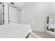 Bright bedroom with white walls, carpet, and simple decor, creating a serene atmosphere at 1232 N Yates St # 3, Denver, CO 80204