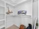 Bright, clean, walk-in closet with white shelving, offering ample storage at 1232 N Yates St # 3, Denver, CO 80204