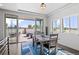 Dining room with modern decor and access to an outdoor patio at 128 Chapel Hill Cir, Brighton, CO 80601