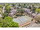 Aerial view showcasing the property's location with a tennis court and lush landscaping in a desirable neighborhood at 18171 E Arizona Ave # B, Aurora, CO 80017
