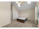 Bedroom with a vaulted ceiling, neutral carpet, a bed frame with an aspen mattress, and closet at 18171 E Arizona Ave # B, Aurora, CO 80017