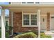 Inviting brick front porch with house number and a cozy, covered entrance at 18171 E Arizona Ave # B, Aurora, CO 80017