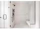Clean bathroom with a walk-in shower and built-in bench at 3120 Braun Ct, Golden, CO 80401