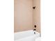 Clean bathroom with a neutral-toned tile shower and black fixtures at 3120 Braun Ct, Golden, CO 80401