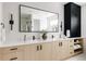 Elegant bathroom boasting double sinks, modern fixtures, and ample storage at 3120 Braun Ct, Golden, CO 80401