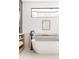 Relaxing bathroom with a modern bathtub and plenty of natural light at 3120 Braun Ct, Golden, CO 80401
