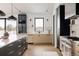 Open concept kitchen with a large island and modern cabinetry at 3120 Braun Ct, Golden, CO 80401