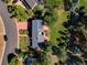 Aerial view of a house with solar panels on the roof and a spacious backyard at 1866 W Davies Ave, Littleton, CO 80120