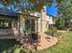 Backyard patio with seating area and lush landscaping at 1866 W Davies Ave, Littleton, CO 80120