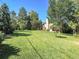 Large backyard with lush green grass at 1866 W Davies Ave, Littleton, CO 80120