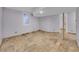 Finished basement with tile flooring and an extra room at 1866 W Davies Ave, Littleton, CO 80120