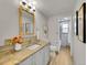 Elegant bathroom with granite countertop and a large mirror at 1866 W Davies Ave, Littleton, CO 80120