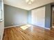 Spacious bedroom with hardwood floors and a closet at 1866 W Davies Ave, Littleton, CO 80120