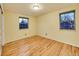 Bright bedroom with hardwood floors and large windows at 1866 W Davies Ave, Littleton, CO 80120