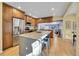 Modern kitchen with granite countertops and stainless steel appliances at 1866 W Davies Ave, Littleton, CO 80120