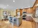 Updated kitchen featuring granite countertops and an island at 1866 W Davies Ave, Littleton, CO 80120