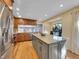 Spacious kitchen featuring granite countertops and ample cabinetry at 1866 W Davies Ave, Littleton, CO 80120