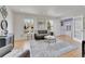 Spacious living room with hardwood floors and neutral decor at 1866 W Davies Ave, Littleton, CO 80120