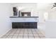 View of the open floor plan from tile entry into the living room at 3570 Center Ave, Denver, CO 80219