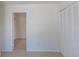 Neutral room with closet space featuring neutral carpet and light walls at 3570 Center Ave, Denver, CO 80219