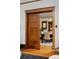 View of the dining room showing original wood trim and pocket door at 1586 Steele St, Denver, CO 80206