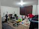 Basement area with exercise equipment and storage, offering versatile space for activities at 155 Paris Cir, Aurora, CO 80011