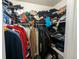 Walk-in closet with clothing racks and shelves, providing ample storage space at 155 Paris Cir, Aurora, CO 80011