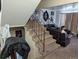 Staircase with adjacent living room at 155 Paris Cir, Aurora, CO 80011