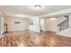 Spacious basement featuring hardwood floors and recessed lighting, perfect for entertaining at 6731 S Kearney Ct, Centennial, CO 80112