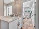 Well-lit bathroom boasts modern finishes, including sleek fixtures and a spacious vanity with great storage at 3219 W 19Th Ave # 3, Denver, CO 80204