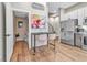 Modern living space with granite countertops, stainless steel appliances and eat-in breakfast bar at 3219 W 19Th Ave # 3, Denver, CO 80204